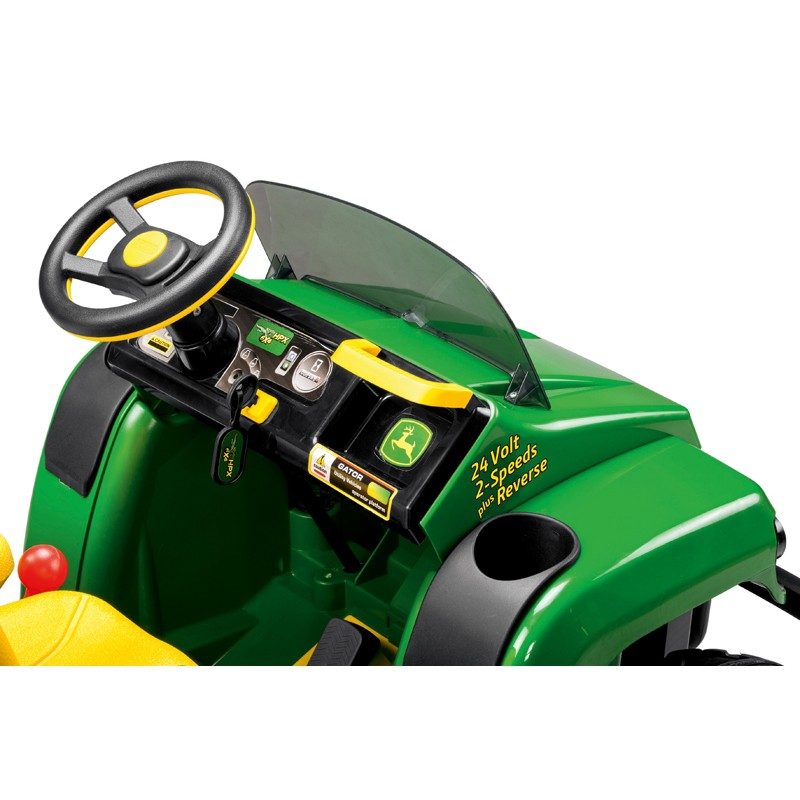Das Elektrofahrzeug Peg Perego John Deere Gator HPX aus unserem Babyfachmarkt, Detailansicht Lenkrad, gelb und grün, 12V